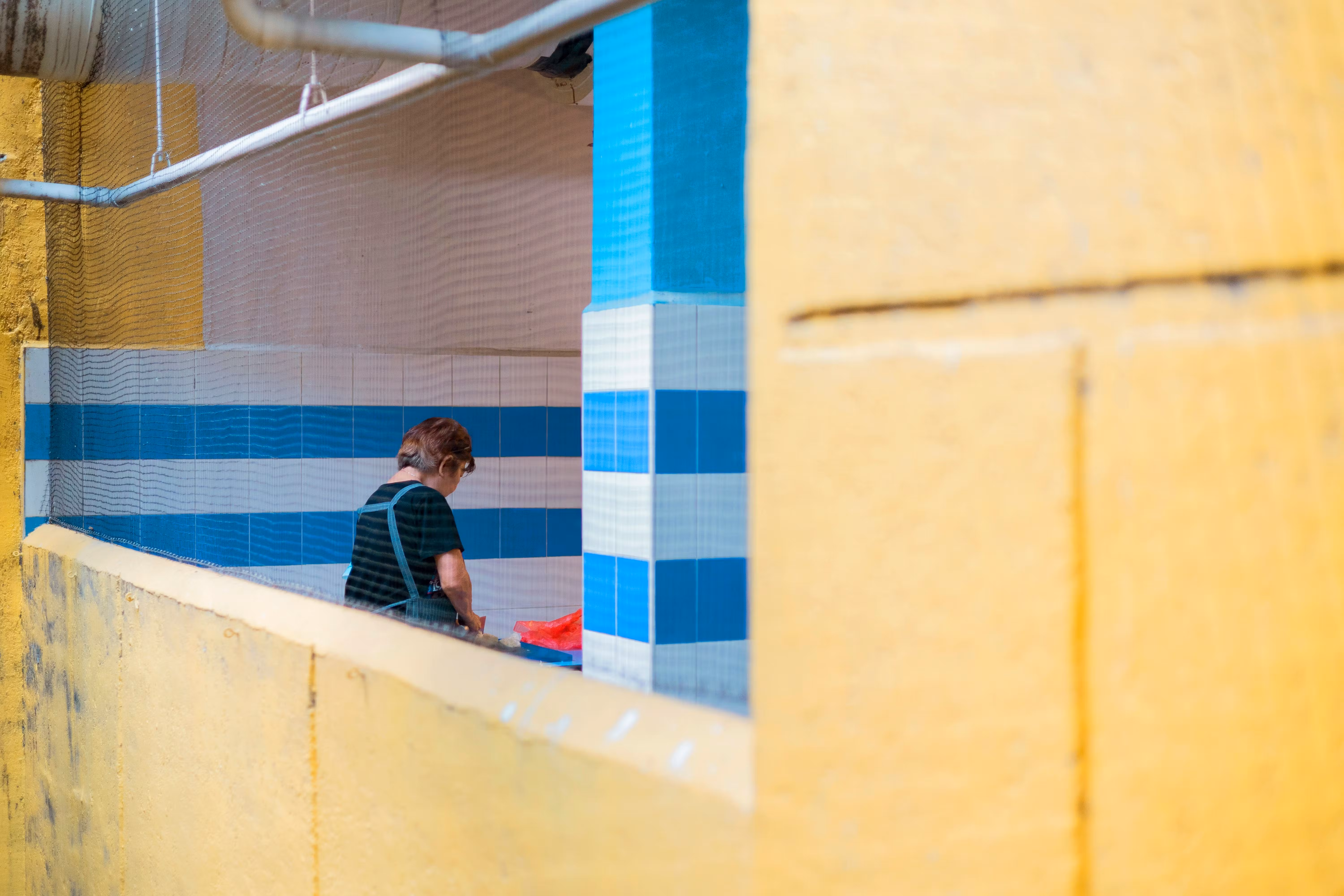 A child sitting in a corner